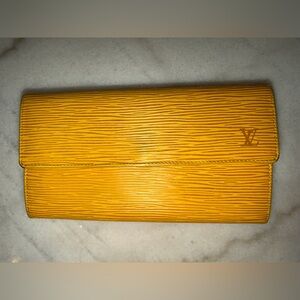 Louis Vuitton Mustard Textured Clutch